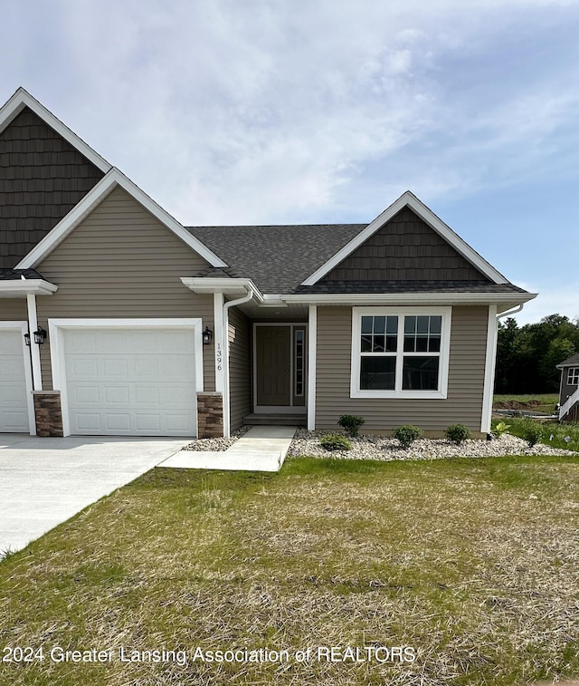 view of front of property with a front lawn