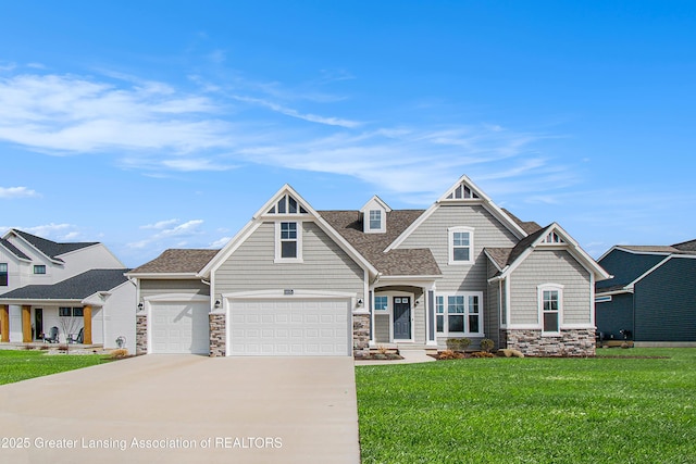 view of front of home featuring stone siding, concrete driveway, and a front yard