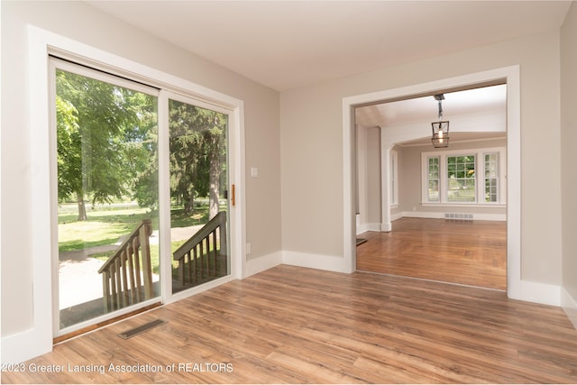 empty room featuring hardwood / wood-style floors