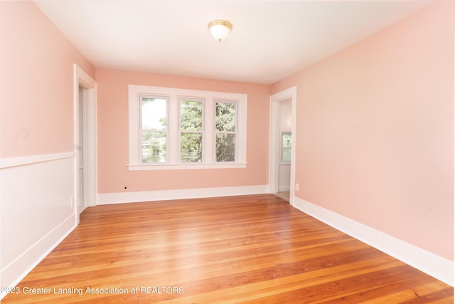 empty room with light wood-type flooring