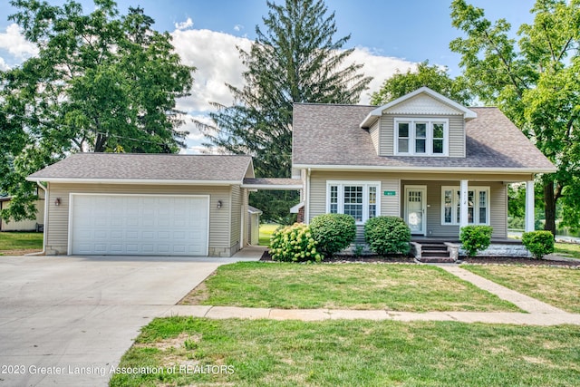 view of front facade with a garage and a front yard