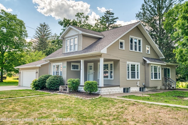 cape cod home with a garage, a front yard, and covered porch