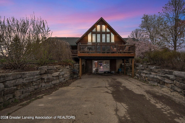 view of front of home with a wooden deck