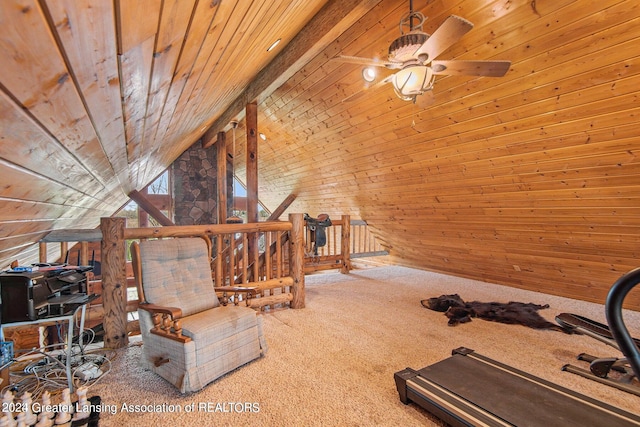 workout room featuring lofted ceiling, light carpet, and wood ceiling