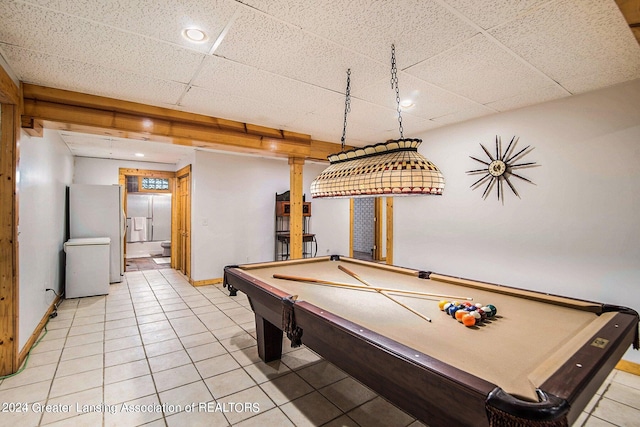 game room with light tile flooring, a drop ceiling, and pool table