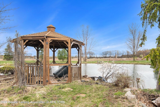 dock area featuring a water view and a gazebo