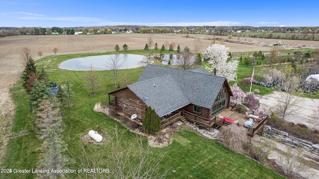 drone / aerial view featuring a rural view and a water view