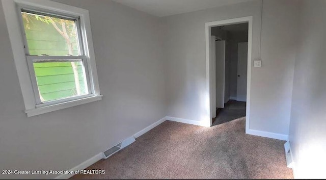 spare room with carpet flooring