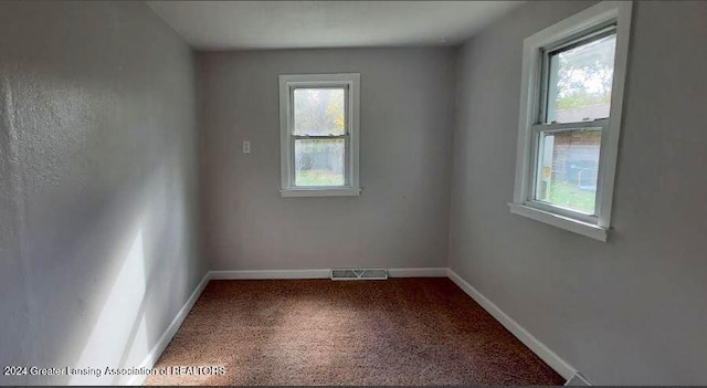 view of carpeted spare room