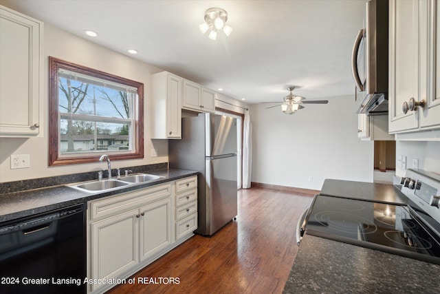 kitchen featuring ceiling fan, stainless steel appliances, dark hardwood / wood-style floors, white cabinetry, and sink