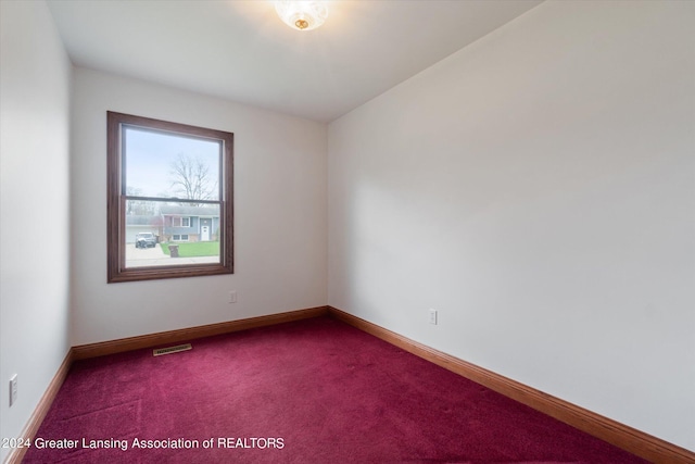 view of carpeted spare room