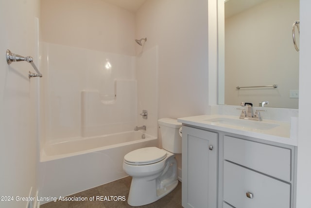 full bathroom with vanity, tile floors, toilet, and shower / tub combination