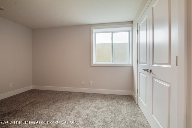 view of carpeted spare room