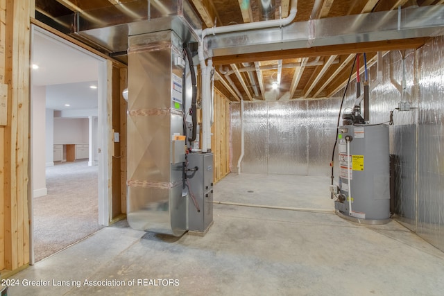 basement featuring heating utilities and gas water heater