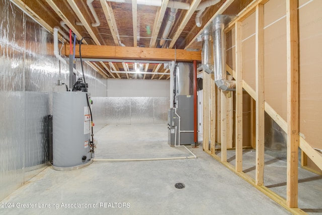 basement featuring heating utilities and gas water heater