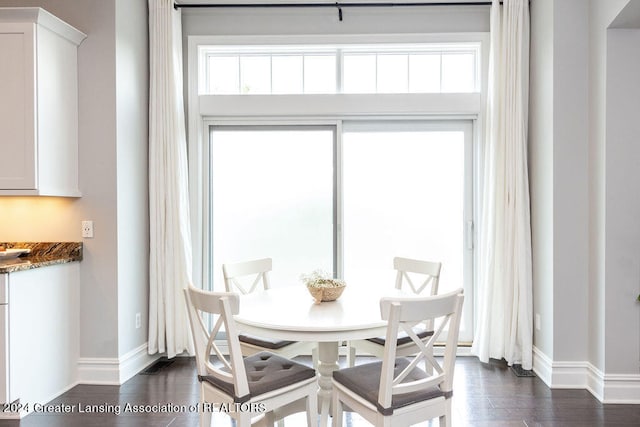 dining room featuring dark hardwood / wood-style floors