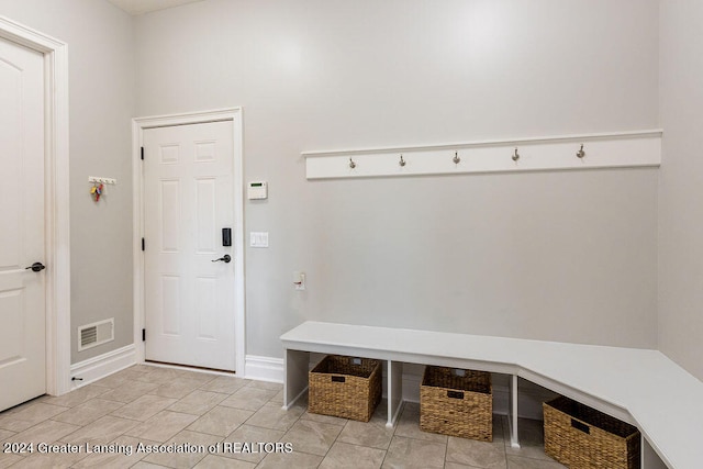 mudroom featuring light tile patterned floors