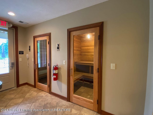 interior space featuring light tile patterned floors