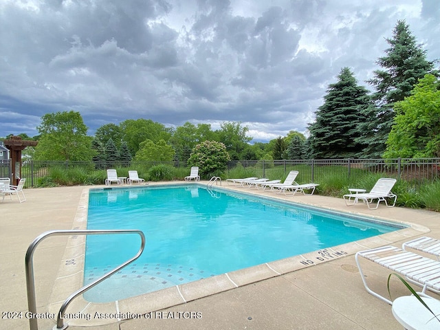 view of pool with a patio