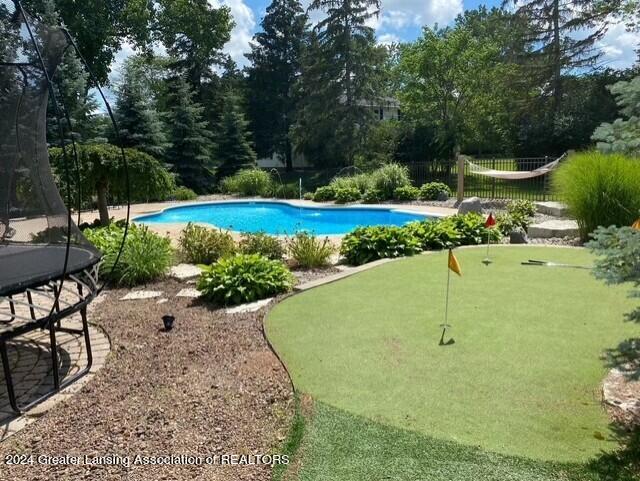 pool with a trampoline