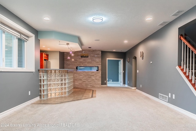 reception area with stairs, visible vents, and arched walkways