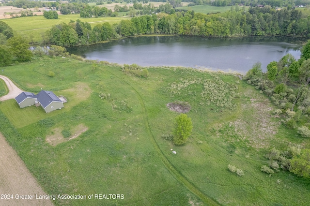 drone / aerial view with a rural view and a water view