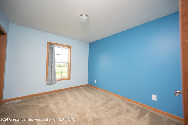 view of carpeted spare room