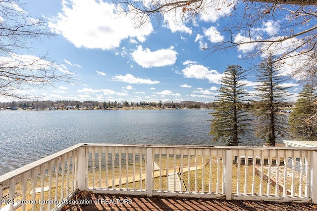 411 N Scott Dr, Farwell, MI 48622 - wooden terrace featuring a water view