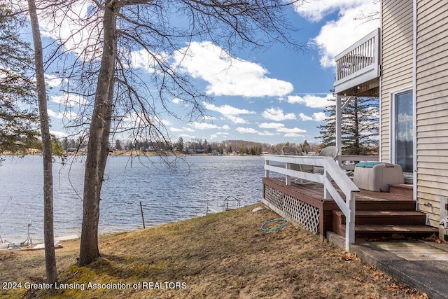 411 N Scott Dr, Farwell, MI 48622 - dock area featuring a water view and a balcony