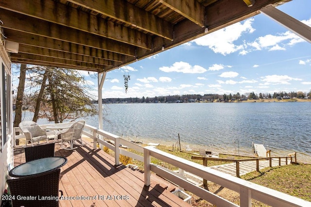 411 N Scott Dr, Farwell, MI 48622 - wooden deck featuring a water view