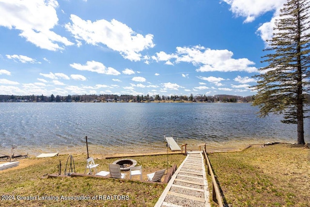 411 N Scott Dr, Farwell, MI 48622 - water view featuring a fire pit