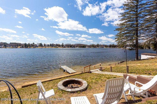 411 N Scott Dr, Farwell, MI 48622 - dock with an outdoor fire pit and a water view