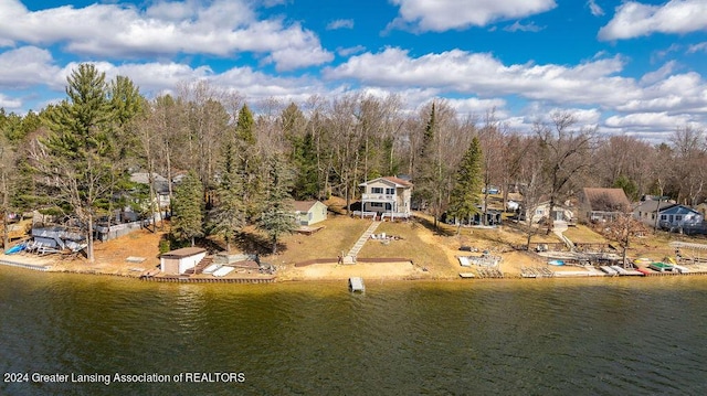 411 N Scott Dr, Farwell, MI 48622 - aerial view of property and surrounding area with a nearby body of water