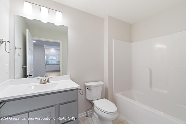 full bathroom with shower / bathing tub combination, vanity, toilet, and tile patterned flooring