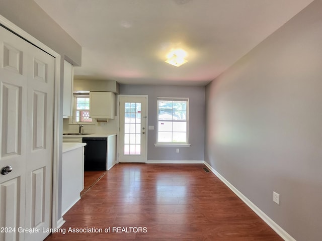 interior space with hardwood / wood-style flooring and sink