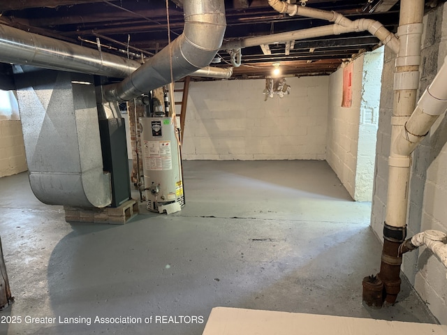 1555 Roosevelt Ave, Lansing, MI 48915 - unfinished basement featuring gas water heater, heating unit, and concrete block wall