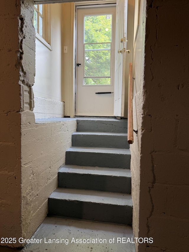 1555 Roosevelt Ave, Lansing, MI 48915 - staircase with plenty of natural light