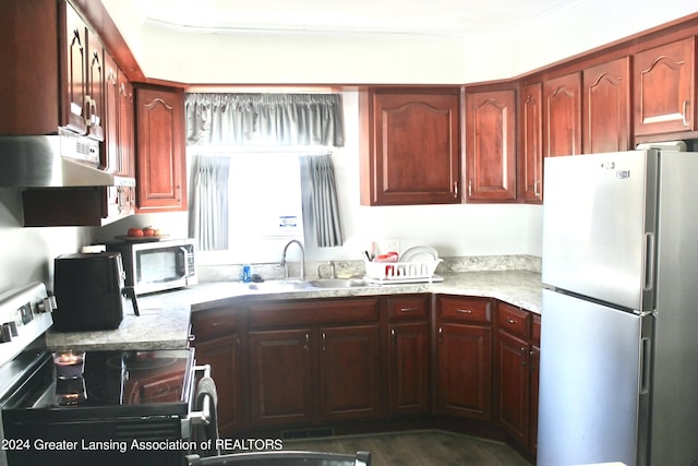 kitchen with appliances with stainless steel finishes and sink