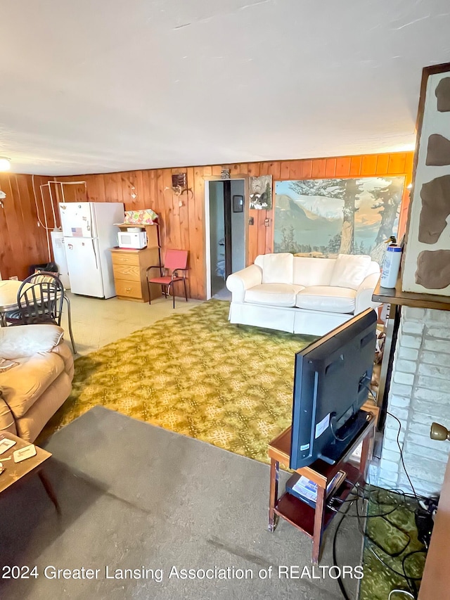 living room featuring wooden walls