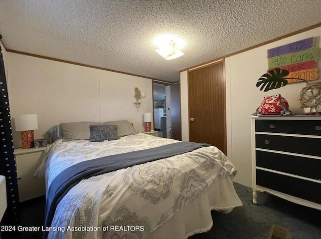 carpeted bedroom with a textured ceiling