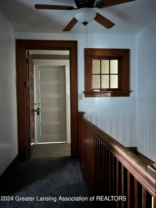 corridor with carpet floors