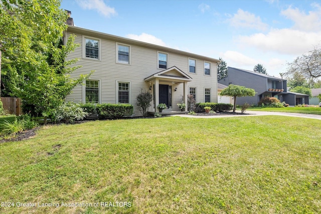 view of front of home with a front yard