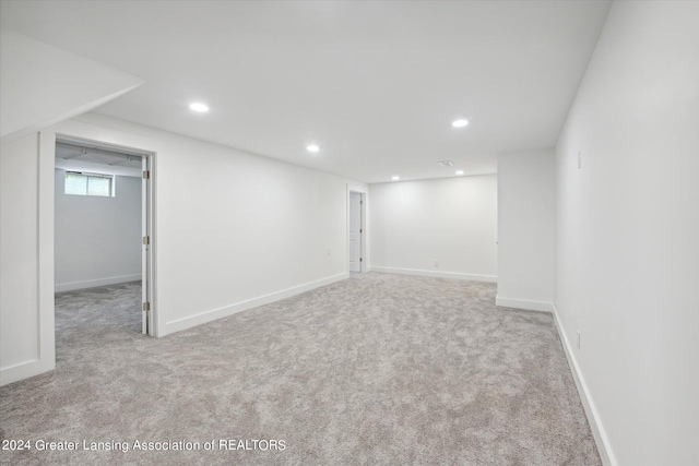 basement with light carpet