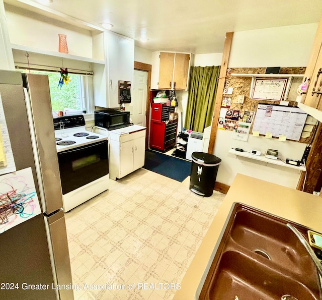 kitchen with white appliances and sink