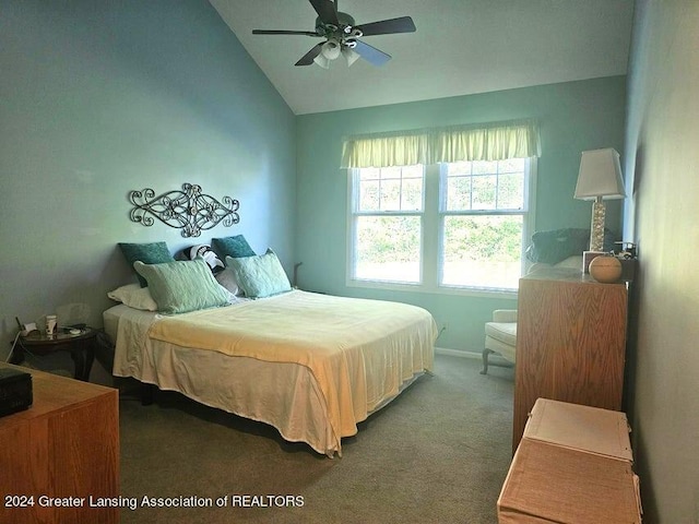 bedroom with carpet flooring, ceiling fan, and vaulted ceiling