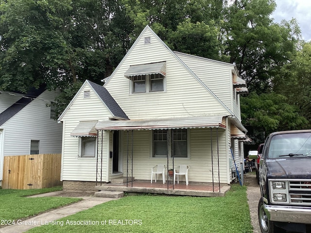 view of front of home with a front yard