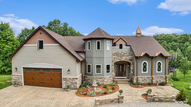 view of front of property with a garage