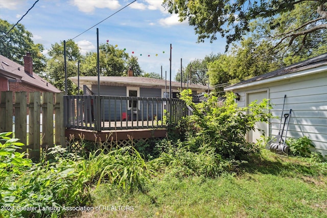 exterior space featuring a wooden deck