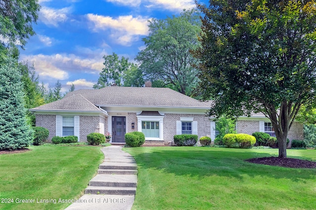 view of front of house with a front lawn