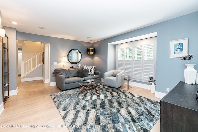 living room with light hardwood / wood-style floors